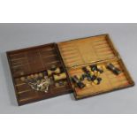 Two vintage sets of backgammon, each set in wooden case with chessboard exterior.