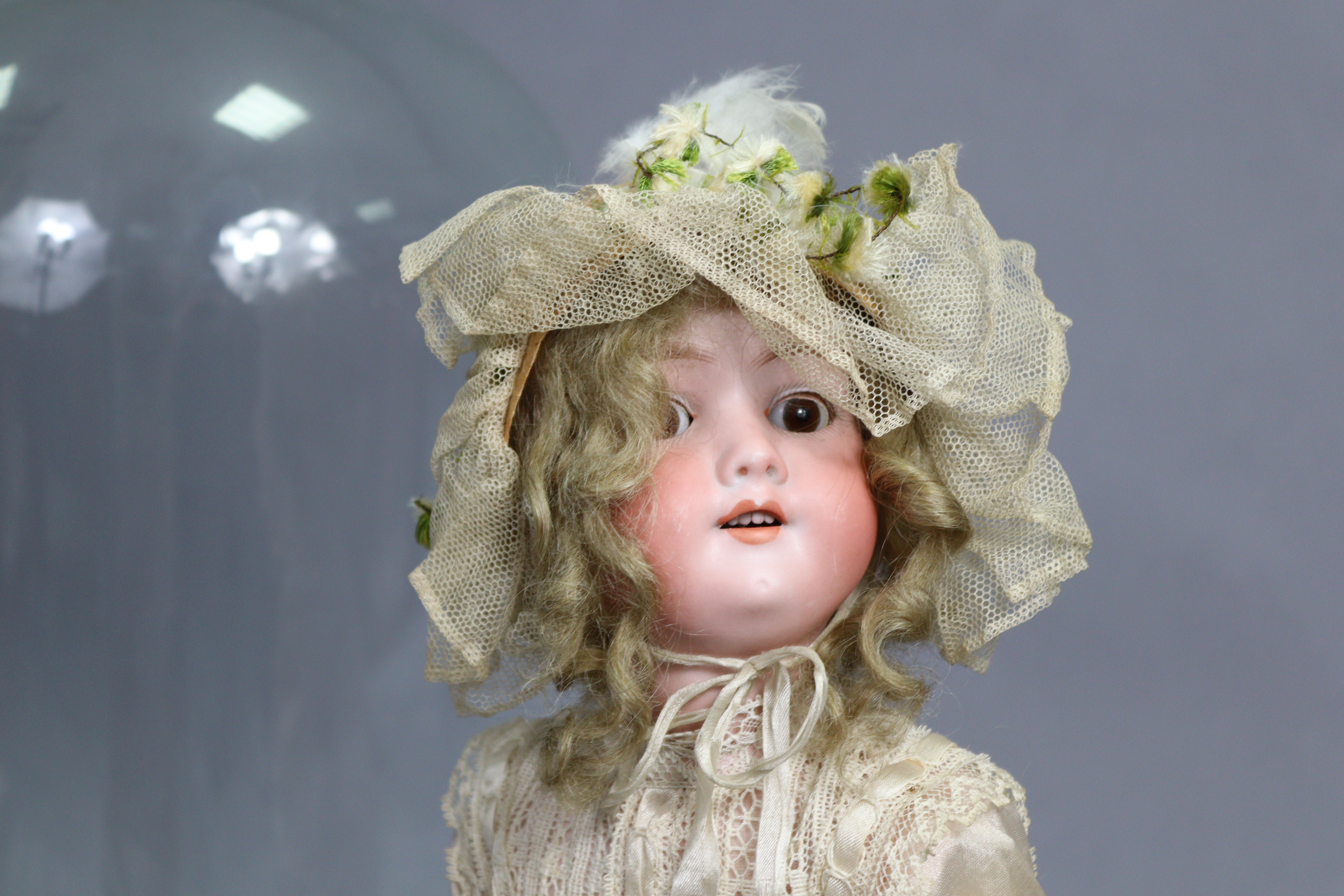 An Armand Marseille bisque-head girl doll, 19" high (lacking one hand); together with a glass domed - Image 2 of 7