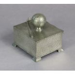 A Pewter cigarette box surmounted with a golf ball & golf club to the hinged lift-lid, & on