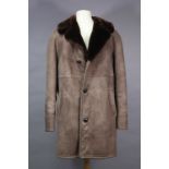 A Fortnum & Mason chocolate brown sheepskin jacket with cream and brown wool lining, shoulder