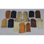 Eleven various pairs of gentleman’s leather and other vintage gloves.