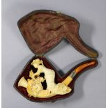 A late 19th century Meerschaum pipe carved with a lady picking flowers, with white metal band, 5½”
