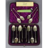 A set of six late Victorian silver teaspoons with fluted bowls & stylised terminals London 1886,