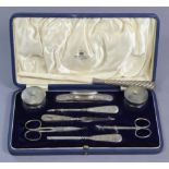 A mid-20th century silver & stainless-steel eight piece manicure set by Mappin & Webb, in a fitted
