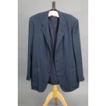 A blue flannel suit jacket with brass buttons tailored by Kilgour, French, & Stanbury Ltd. of Savil