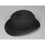 A Christy of London black felt bowler hat (given to assistants at the Badminton Horse Trials),