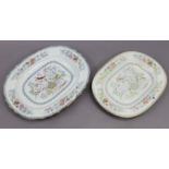 Two Victorian floral decorated meat plates, 21½”, & 19¼” wide.