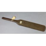 A South Pacific wooden paddle (?) of rectangular plain form with rounded handle, old collector’s la