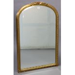 A large gilt frame rectangular wall mirror with beaded edge, having raised foliate design to the
