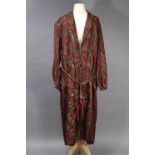A ‘Jacqmar Fabric’ paisley pattern dressing gown, shoulder width 19”, length 55”; and a ‘Curwen &