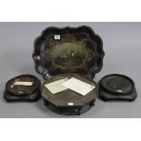 A late 19th century black papier mâché tray with pictorial scene to centre & with a lobed border,