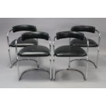 A set of four chrome-plated dining chairs each with a padded seat & back upholstered black vinyl.