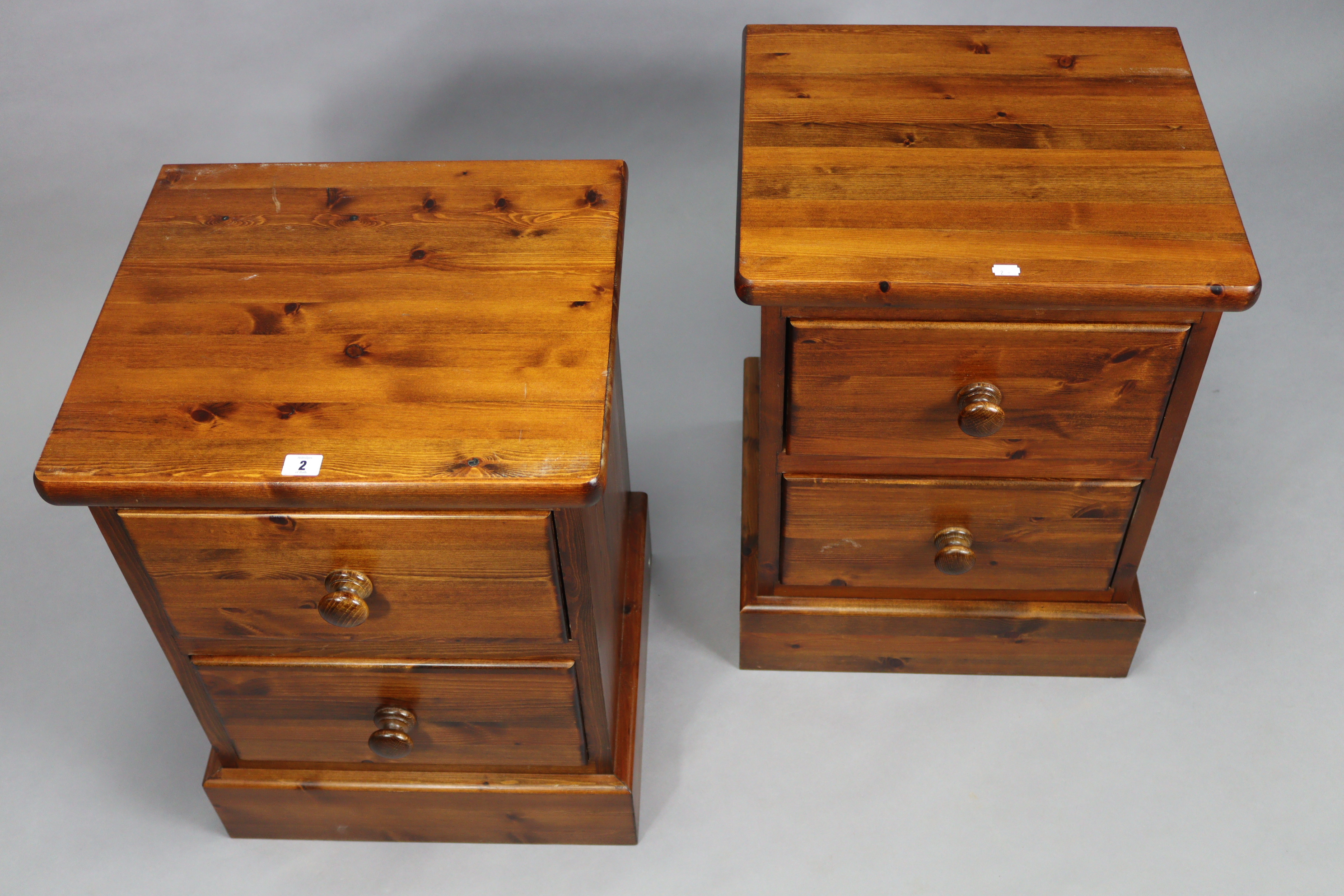 A pair of pine two-drawer bedside chests, 18¾” wide x 25” high x 16¾” deep. - Image 2 of 3