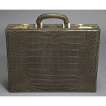 A ZILLI OF FRANCE GREY CROCODILE LEATHER ATTACHÉ CASE with combination locks, grey leather and