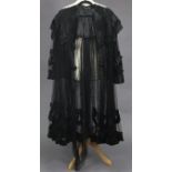 A vintage black satin & lace ladies’ dress, bears label “Oates & Mousson, Stamford”.