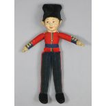A vintage Lenci-type boy soldier cloth doll, 14½” high.