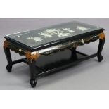 A Chinese-style black chinoiserie rectangular two-tier low coffee table with coloured figure-scene