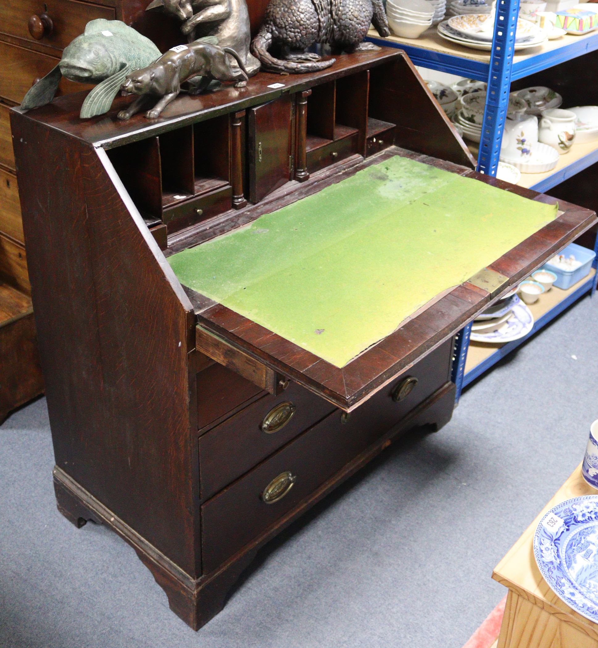 A late 18th century mahogany bureau, the fall-front enclosing a fitted interior above an arrangement - Image 2 of 2