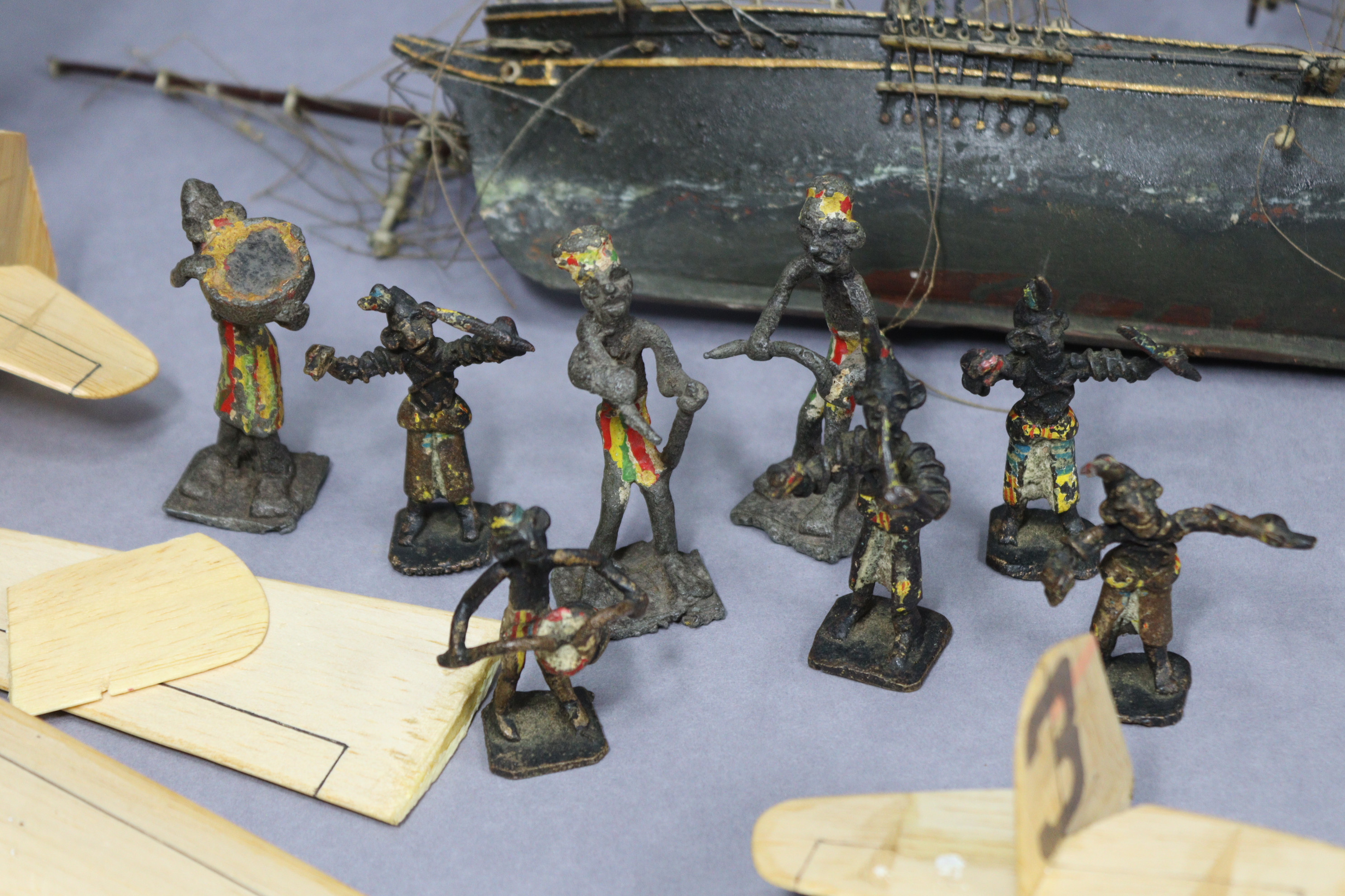 Eight painted lead African bandsmen figures; together with two wooden model ships; & three balsa - Image 2 of 12