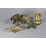 A trench art brass model ship signed J. Fry, 5¾” wide; a bronzed koi carp incense burner, 7” wide; &