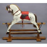 A mid-20th century dapple grey painted wooden rocking horse, probably by J. Collinson & Sons of Live