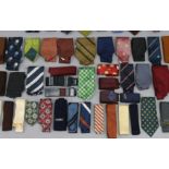 A collection of 64 silk and other neck ties by HERMES, Dior, Sulka, Liberty, etc.