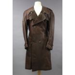 A Burberry chocolate brown leather long jacket with silk lining; shoulder width 19”, length 43” (