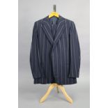 A blue and grey striped navy blue suit jacket & matching trousers tailored by H. Huntsman & Sons