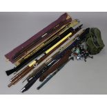Seven sea-fishing rods; four fishing reels; various lures, etc.