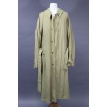 A Fortnum & Mason cream coloured belted overcoat, shoulder width 20”, length 52”.