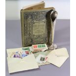An early 20th century small album & contents of GB & foreign stamps; a small quantity of loose
