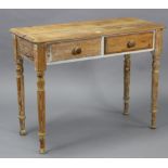 A pine side table fitted two frieze drawers, & on turned tapered legs, 38” wide x 29” high x 16¾”
