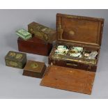 An artist’s mahogany portable paint box with contents, 17” wide; together with a 19th century