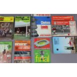 Thirty-eight various football programmes, circa 1968 onwards; & thirty issues of “Football League