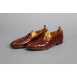 CODNER, COOMBS & DOBBIE Ltd.; A pair of crocodile leather brown loafers (size between 8/9), each