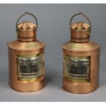 A pair of Heklight copper ship’s lanterns, 9” high.