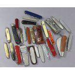 A collection of twenty-six various pocket knives.