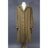 A Christopher Barry light brown wool belted overcoat, made in Italy by D’AVENZA, ROME, for