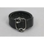 HERMES, Paris; A black leather belt with jewelled and entwined snake buckle, 40½” long (including