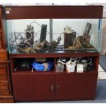 A mahogany-finish & tempered glass 42” x 22” x 15” aquarium on mahogany finish cabinet base, 49”