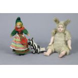 A bisque head girl doll with bisque arms & legs & bunny costume, 12” high; a Norah Wellings Tyrolean
