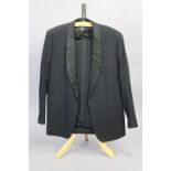 A black morning suit jacket and matching trousers tailored by Widman & Dodd, 9.03.1950, shoulder