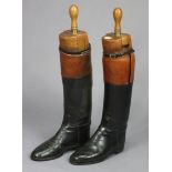 A pair of vintage black leather riding boots (size 7.5), with treen trees, bears label “Rowell &