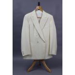 A cream coloured suite jacket tailored by H. Huntsman & Sons Ltd. of Saville Row, 21.03.1989; shoul