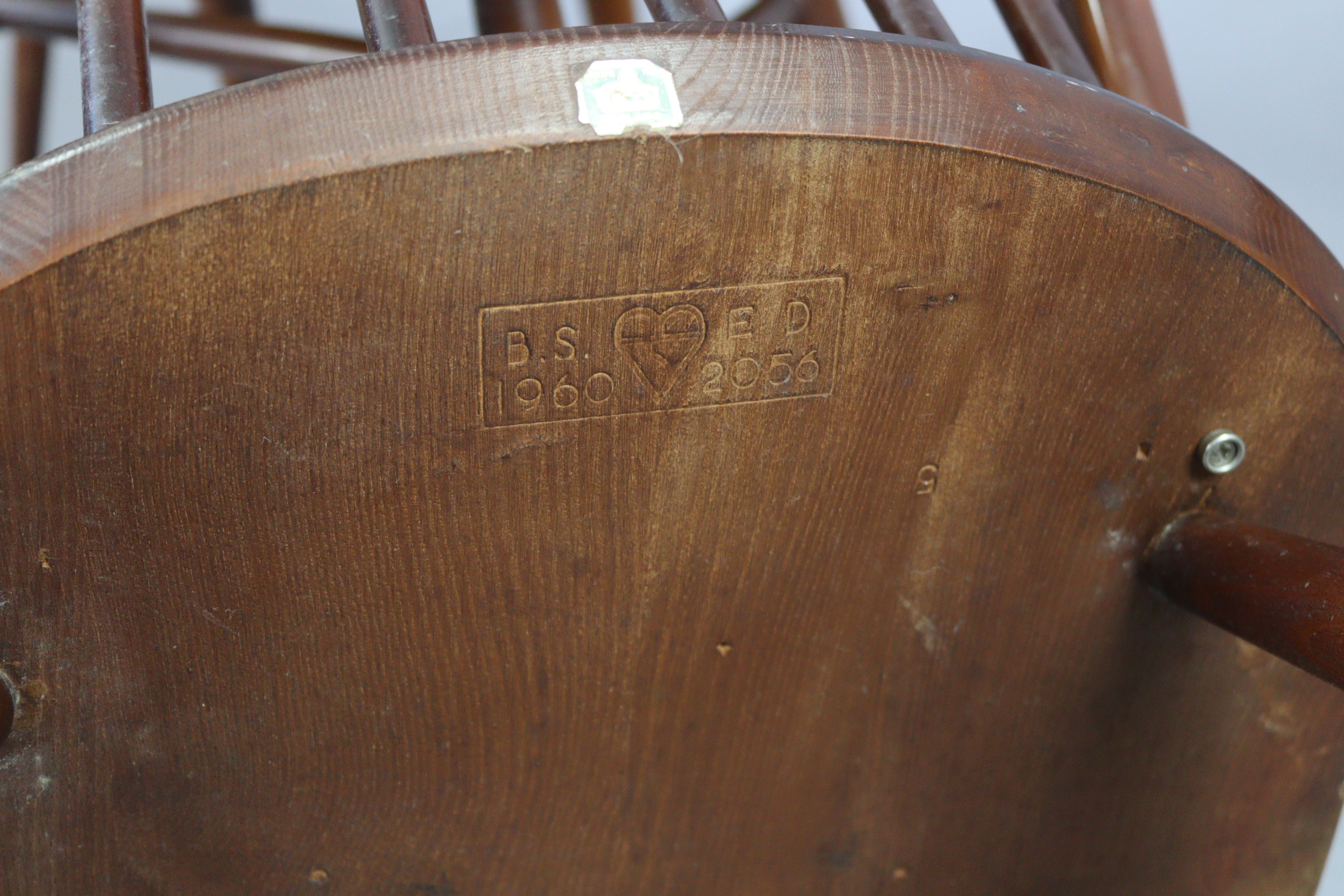 A set of four Ercol spindle-back dining chairs with hard seats, & on round tapered legs with spindle - Image 6 of 6