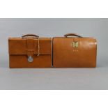 A brown leather document case with Bramah lock stamped “H. MITCHELL & Co. LONDON”, fitted four