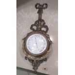 An early 20thC silver plated on copper Holosteric barometer 23''h OS7