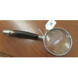 A magnifying glass,