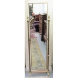 A 20thC gilt brass finished cheval mirror, the pillars surmounted by urn shaped finials,
