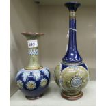 Two similar Doulton Lambeth blue and green glazed stoneware vases of bulbous form with long,
